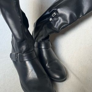 Tall black heeled boots